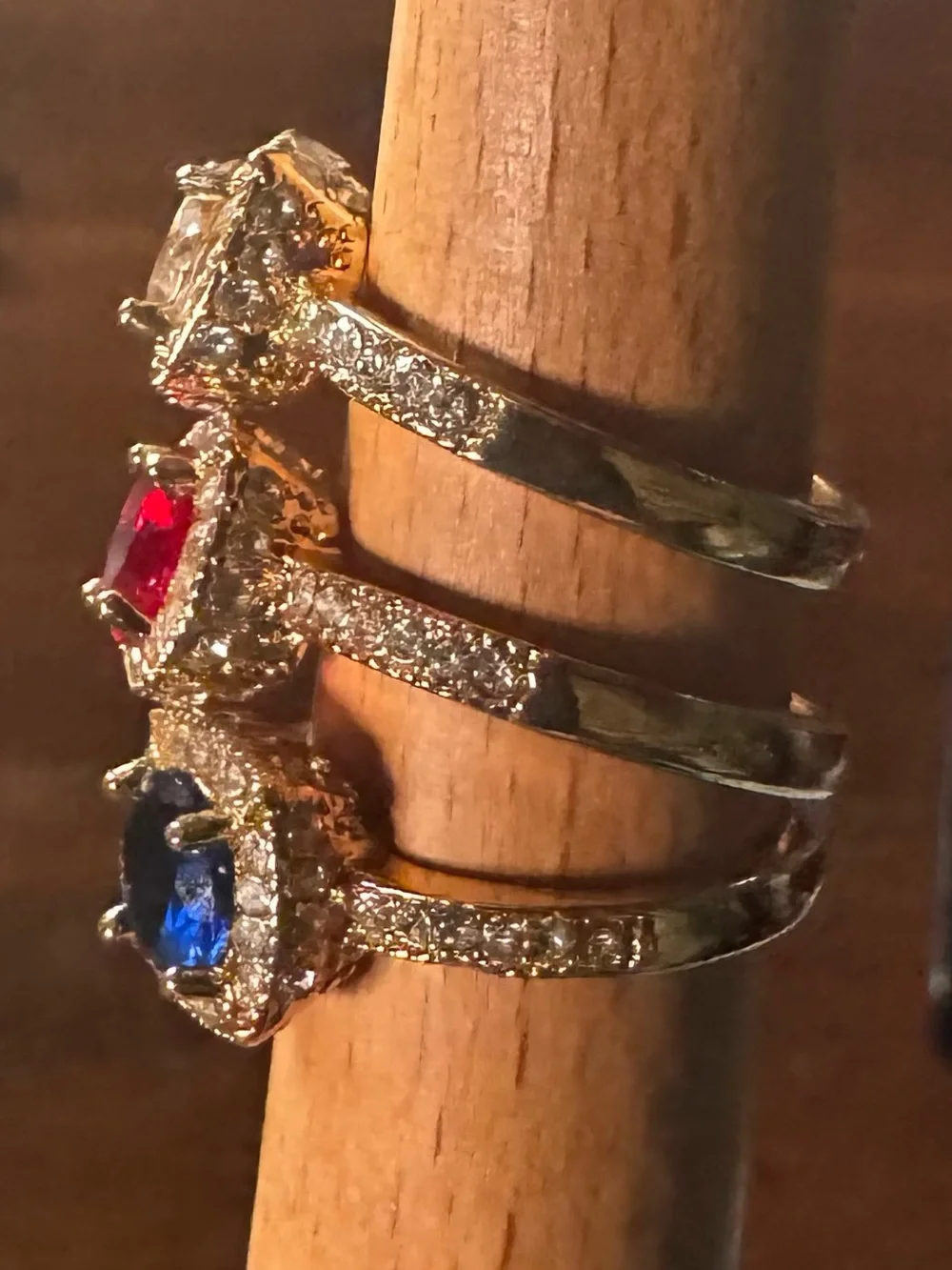 Gold Halo Ring with Blue, red, peach Cushion Gem